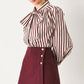 Flying Tomato Merlot Ridge woven skort in burgundy, showing the front view with a subtle woven texture and side pockets.