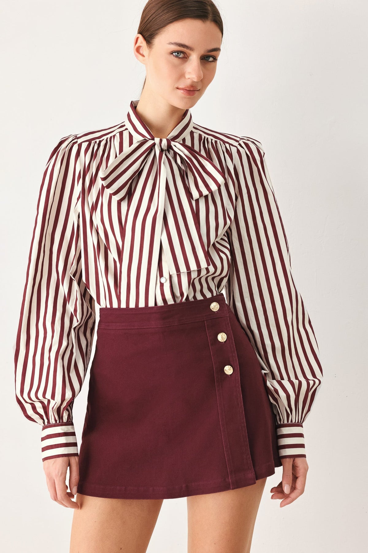 Flying Tomato Merlot Ridge woven skort in deep burgundy with a sleek, stylish design and subtle woven texture.
