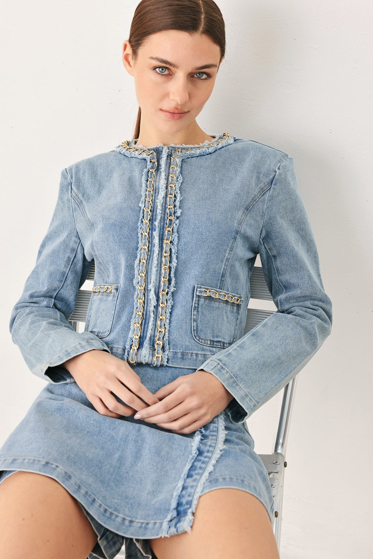 Flying Tomato SKYWARD linked denim crop skort in light denim, featuring a stylish design with a front slit and functional pockets.
