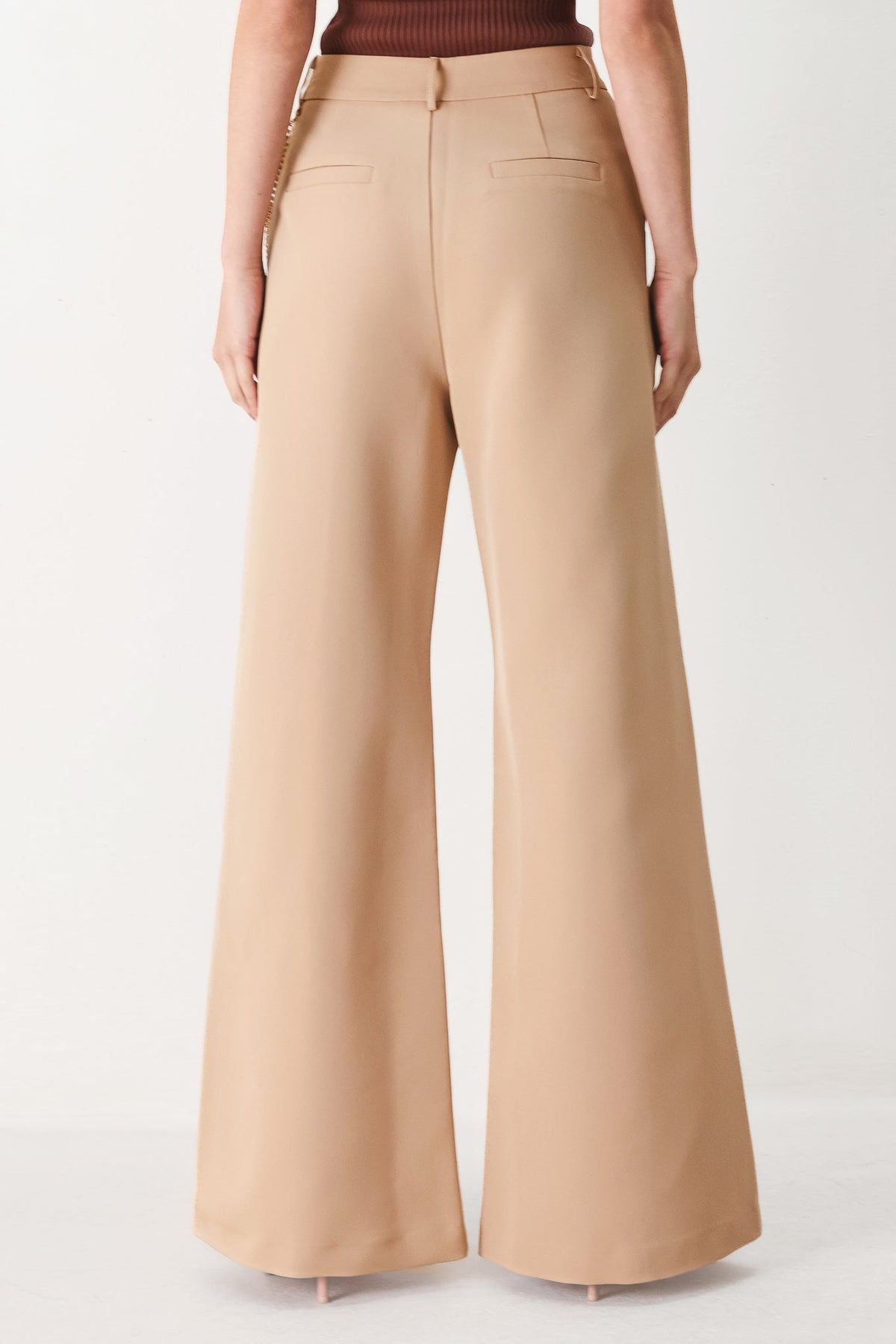 Flying Tomato Crystal Bay woven pants in camel color, featuring a relaxed fit and woven fabric, suitable for casual wear.