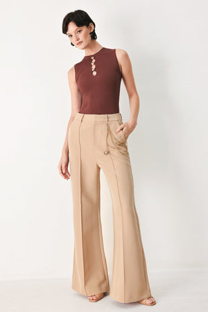 Flying Tomato Crystal Bay woven pants in camel color, featuring a relaxed fit with intricate woven fabric details.