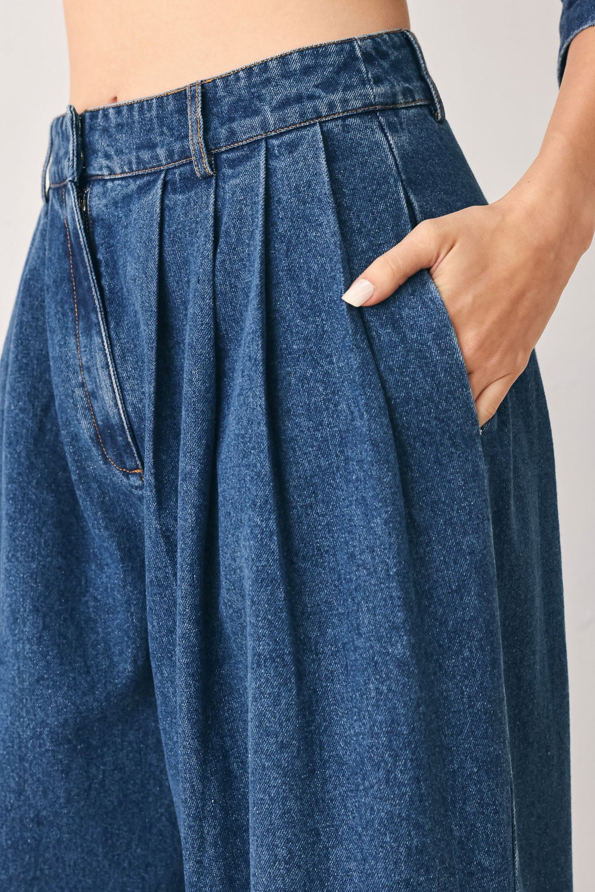 Flying Tomato blue echo pleated denim wide-leg pants with a relaxed fit and pleated design in medium indigo denim.