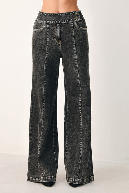 Black Flying Tomato Downtown Edge Crossover Denim Pants with stylish design and fitted waist, shown on a model.