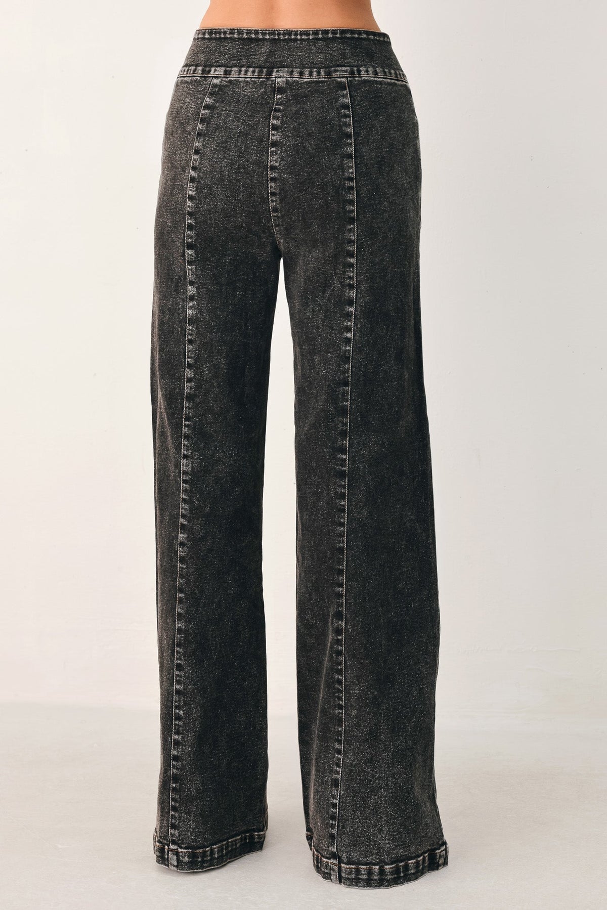 Flying Tomato Downtown Edge crossover denim pants in black, showcasing a stylish fit and modern design.