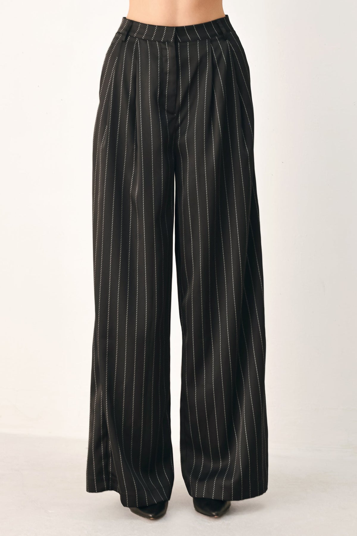 Flying Tomato City After Dark striped wide-leg pants in black, showing the relaxed fit and stylish design.