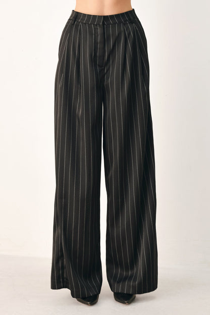 Flying Tomato City After Dark striped wide-leg pants in black, showing the relaxed fit and stylish design.