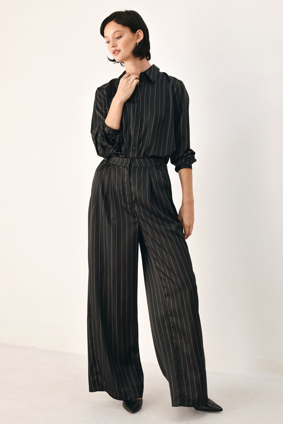 Flying Tomato City After Dark striped wide leg pants in black, showcasing relaxed fit and stylish design.