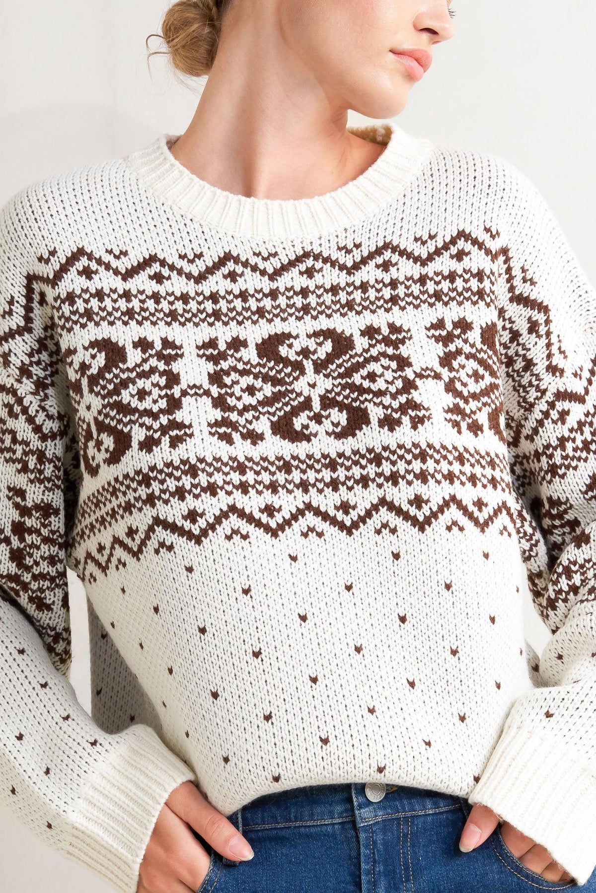 Cream and brown Snowflake Glam pullover sweater by Flying Tomato with snowflake patterns and cozy knit texture.