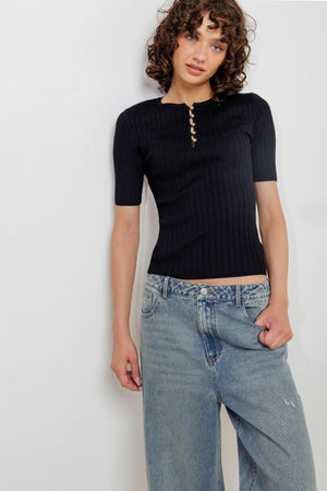 Black Flying Tomato Modern Curl Sweater Knit Top with a cozy, textured knit design and relaxed fit.