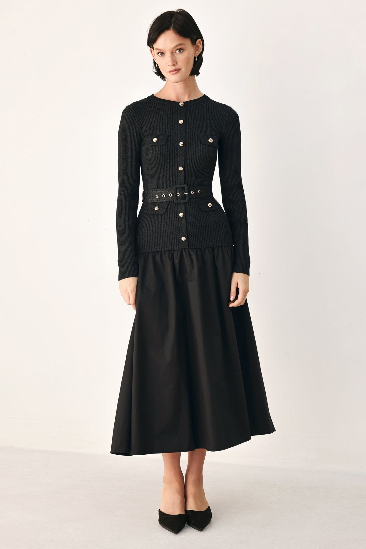 Black Flying Tomato City After Dark mixed media midi dress displayed on a hanger with a sleek, modern design.