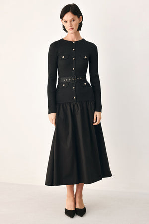Black Flying Tomato City After Dark mixed media midi dress displayed on a hanger with a sleek, modern design.