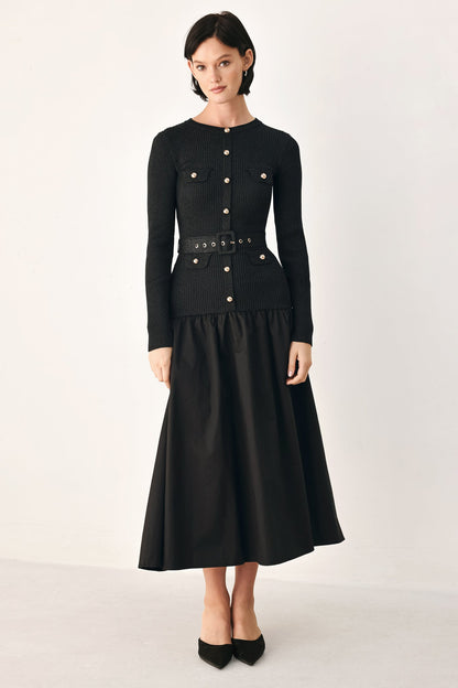 Black Flying Tomato City After Dark mixed media midi dress displayed on a hanger with a sleek, modern design.