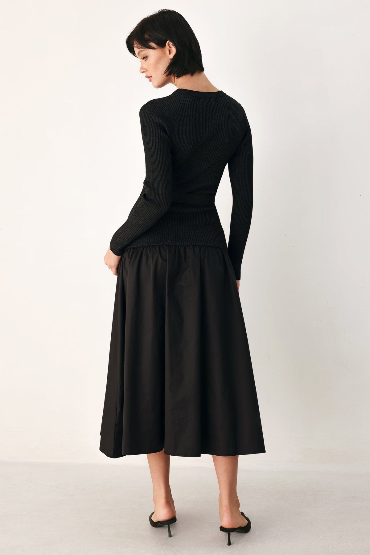 Flying Tomato City After Dark mixed media midi dress in black, showcasing a stylish, patterned design perfect for evening wear.
