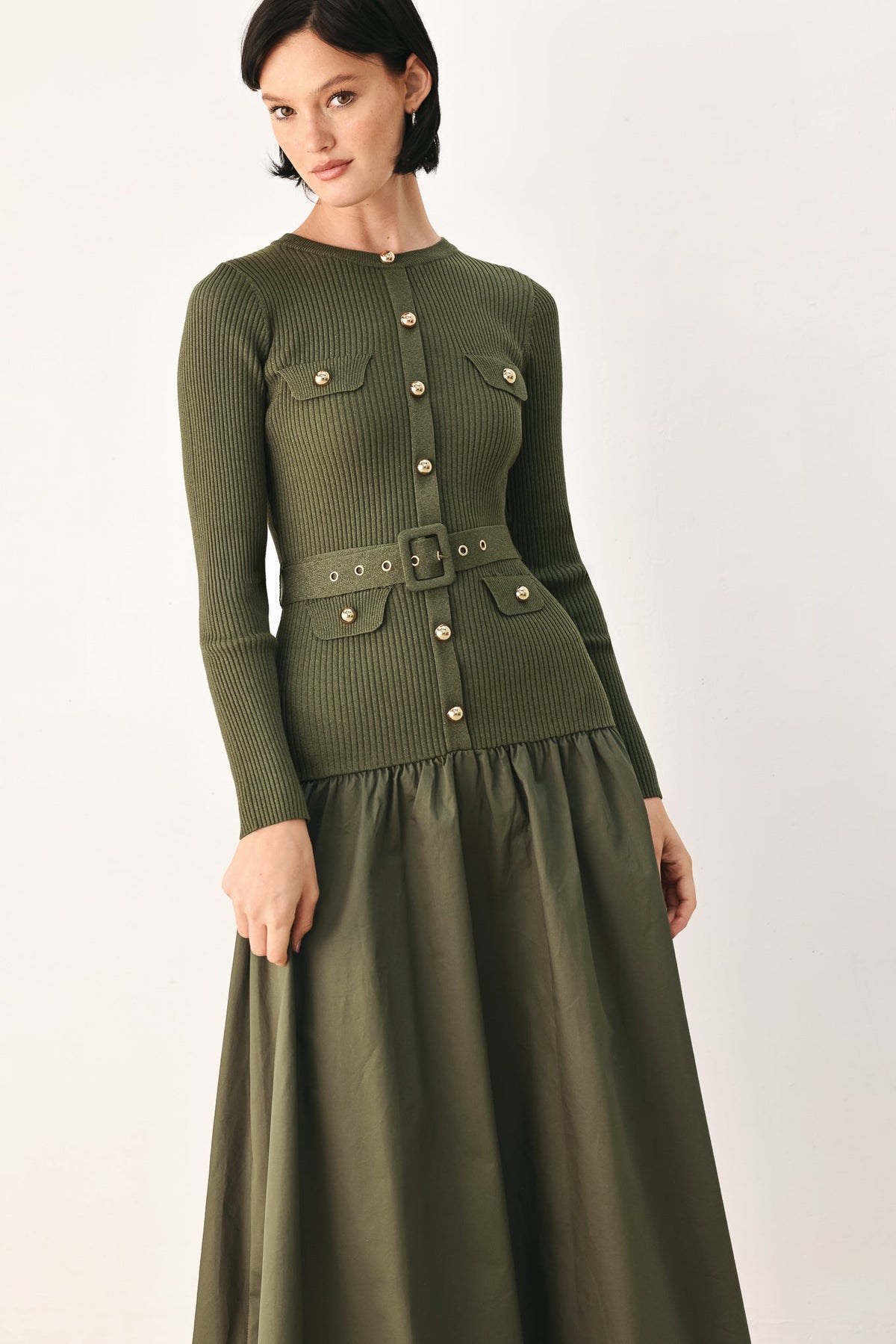Olive green Flying Tomato City After Dark mixed media midi dress displayed on a hanger.