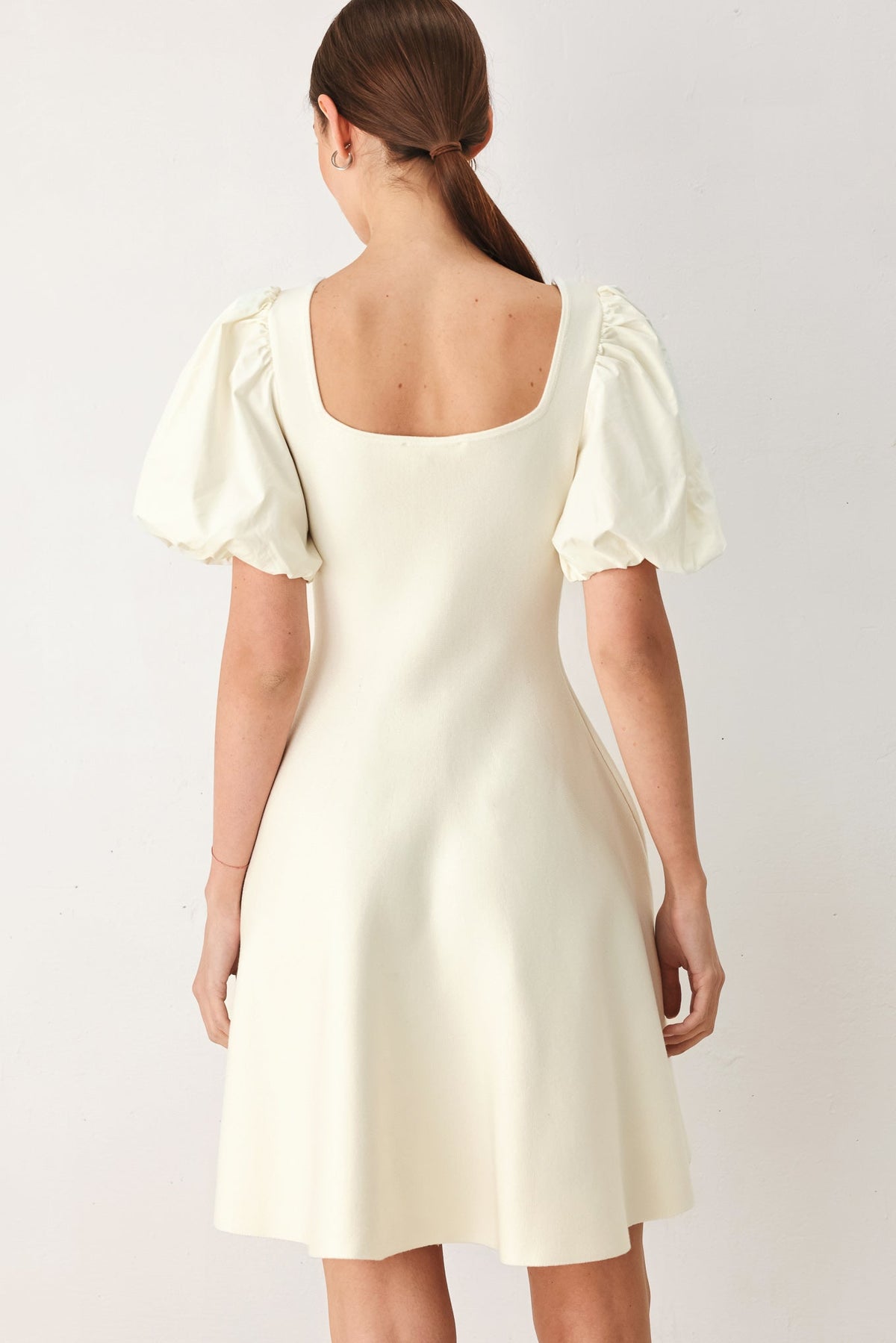 Flying Tomato Buttercream Darling Sweater Knit Mini Dress in ivory, featuring a cozy, textured knit fabric and a stylish mini length.