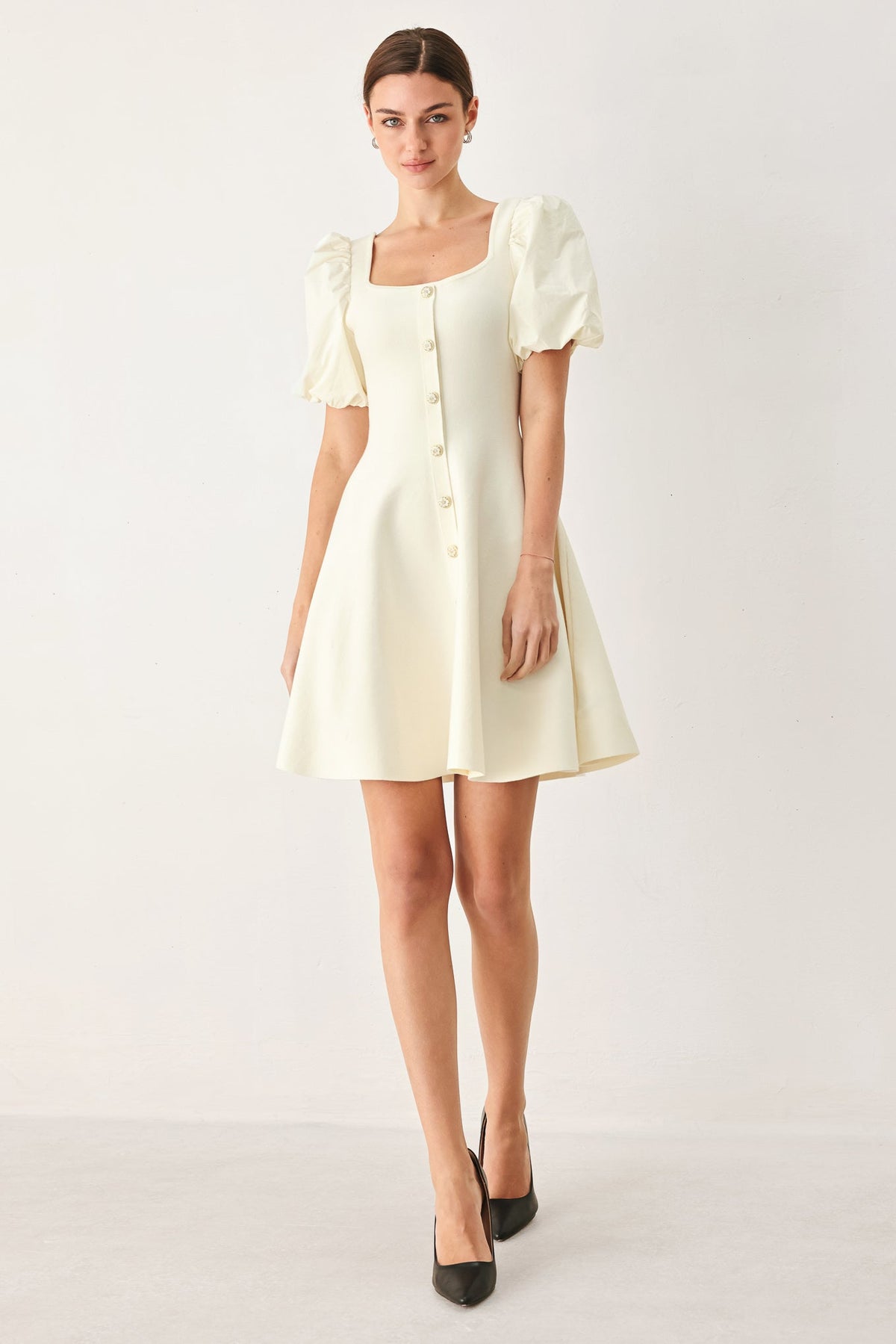 Ivory Flying Tomato Buttercream Darling Sweater Knit Mini Dress with long sleeves and fitted silhouette.