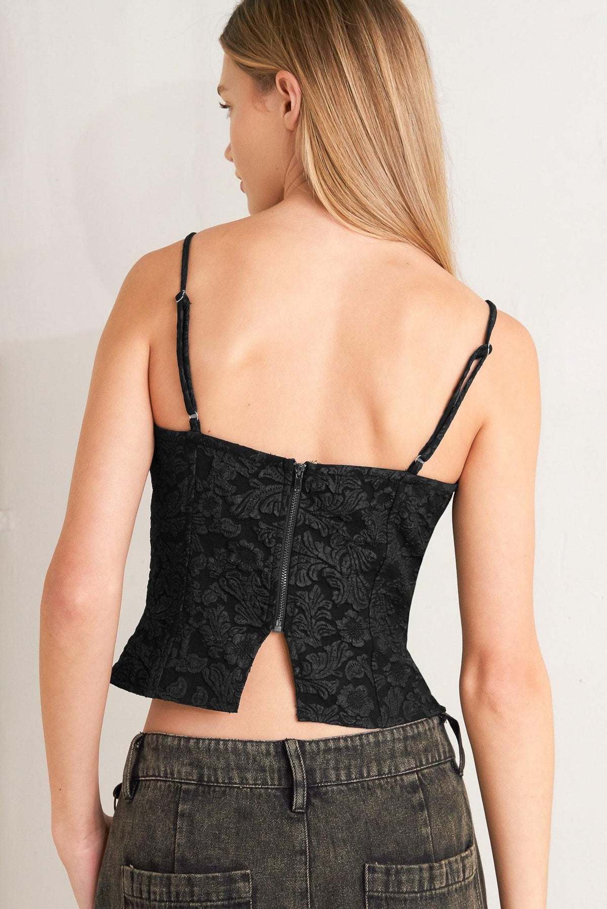 Black Forever Daydreaming woven top by Flying Tomato, featuring a relaxed fit with textured fabric and stylish design details.
