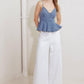 Light denim Sandy Waltz cami top by Flying Tomato, featuring a casual sleeveless design and adjustable straps.