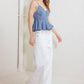 Light denim Sandy Waltz cami top by Flying Tomato, featuring a relaxed fit and sleeveless design with adjustable straps.