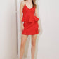 Red woven cami top from Flying Tomato with melted marshmallow design, lightweight fabric, and adjustable straps.
