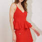 Red woven cami top from Flying Tomato's Meltdown Marshmallow collection, featuring a soft, textured fabric and adjustable straps.