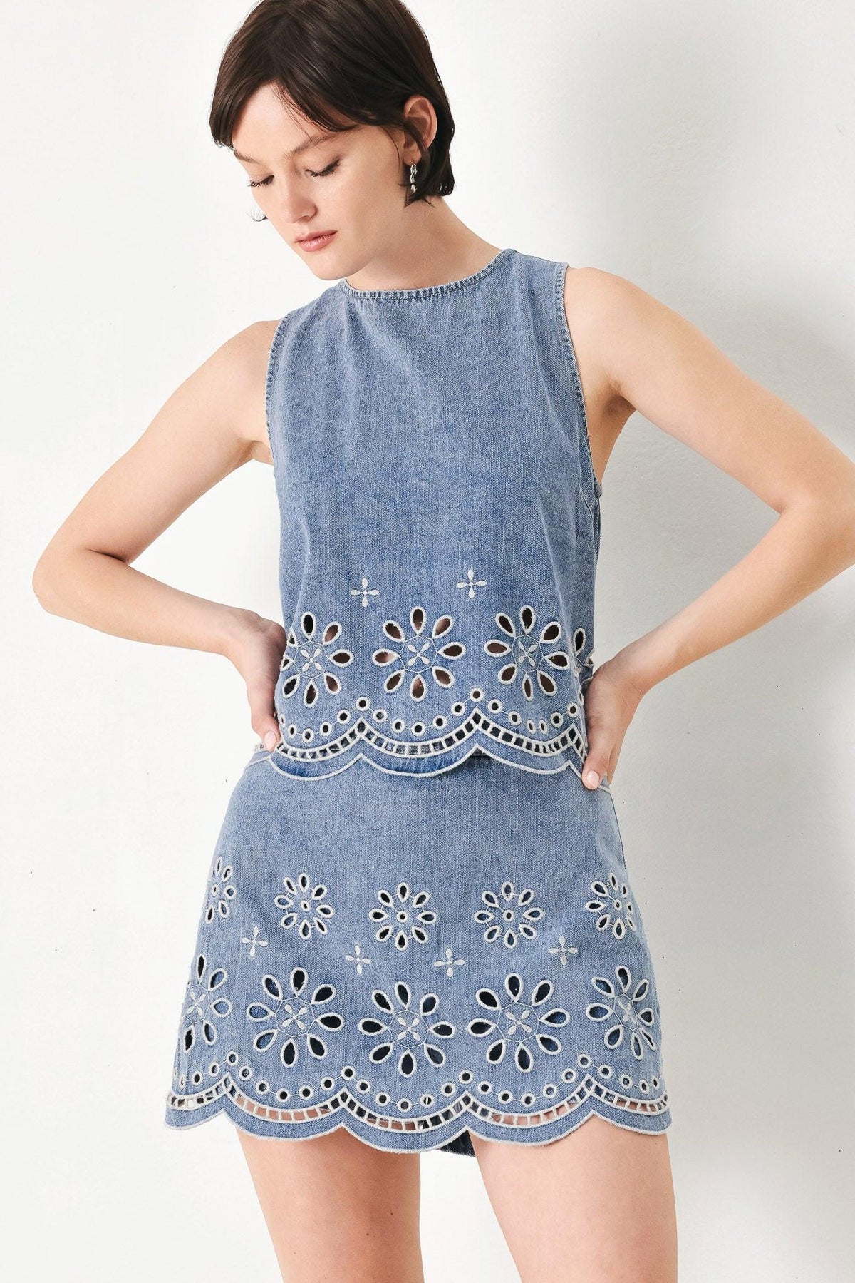 Light denim floral love top by Flying Tomato, casual denim blouse with floral embroidery, front view.
