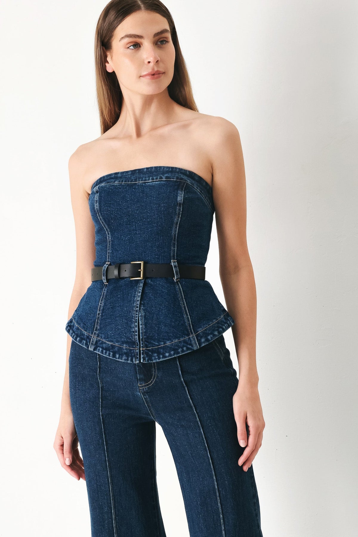 Flying Tomato Skyline Flare Denim Tube Top in indigo denim, featuring a fitted design and flare details.