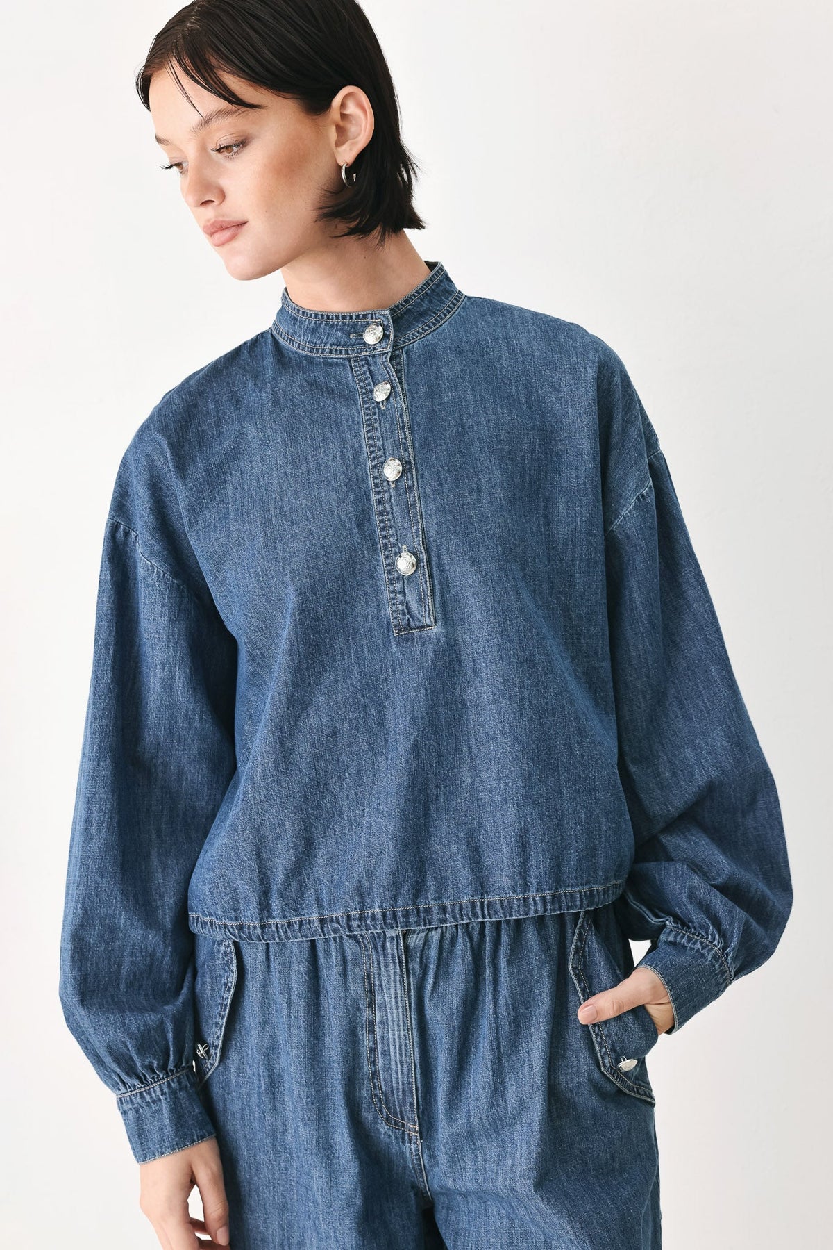 Flying Tomato Indigo Comfort Line denim top, casual fit with classic blue denim fabric and button details, styled on a model.
