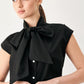 MODERN STATEMENT BOW WOVEN TOP