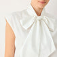 MODERN STATEMENT BOW WOVEN TOP