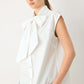 MODERN STATEMENT BOW WOVEN TOP