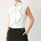 MODERN STATEMENT BOW WOVEN TOP
