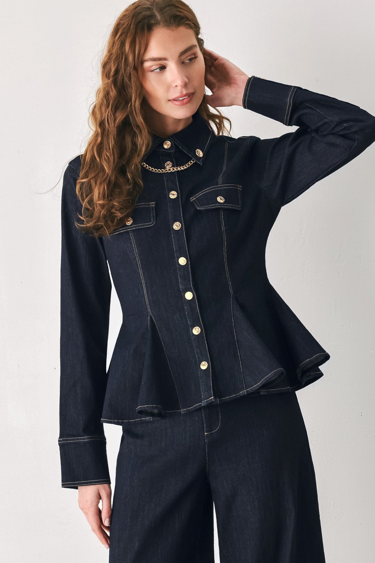 Dark indigo denim peplum top with chain detail from Flying Tomato, featuring a fitted silhouette and stylish design.