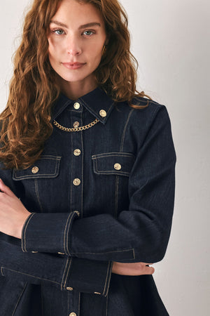 Dark indigo denim peplum top with chain detail from Flying Tomato's Indigo Icon collection, featuring a stylish, fitted design.