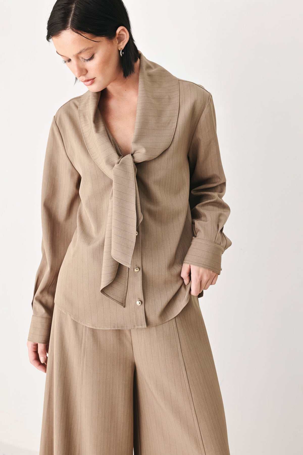 Flying Tomato Mocha Muse scarf tie button-down top, shown in a stylish mocha color with collar and button details.