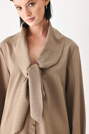 Flying Tomato Mocha Muse scarf tie button-down top, showing the stylish collar and button details in a close-up image.