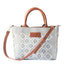 Tan leather Gabrielle small woven crossbody bag by Tin Marin Brand, featuring intricate weaving and a compact, stylish design.