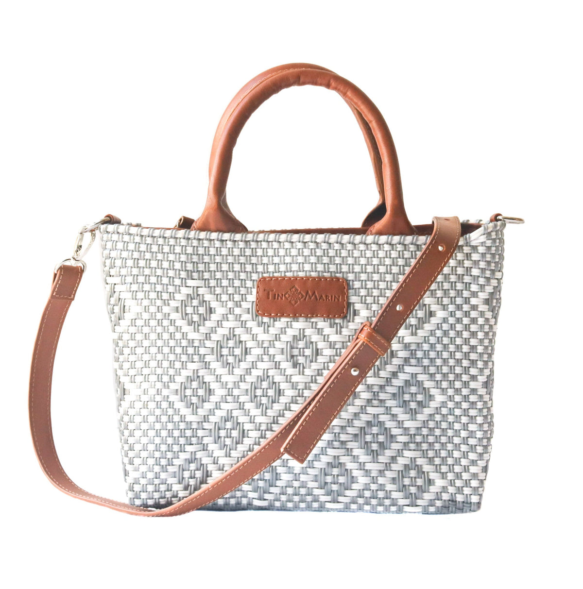 Tan leather Gabrielle small woven crossbody bag by Tin Marin Brand, featuring intricate weaving and a compact, stylish design.