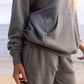 God's Still Working Unisex Hoodie