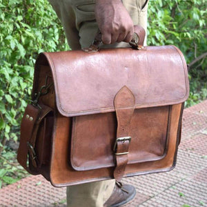 Leather messenger bag from Classy Leather Bags, featuring a stylish design with adjustable strap and multiple compartments.