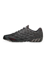 Black Adidas x Bad Bunny Mens F50 footwear shown from a side view, featuring sleek design and brand logo on the lateral side.