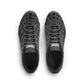Black Adidas x Bad Bunny Mens F50 footwear with white accents, shown from a top portrait view.