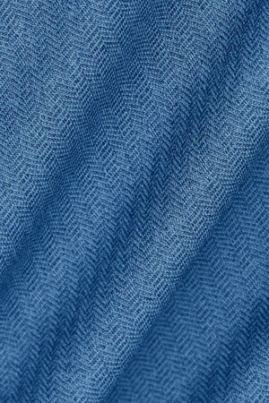 Blue long sleeve button-down polo shirt in herringbone fabric by Twillory, stylish and tailored for a polished look.