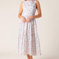 Flying Tomato Thena Garden Party woven eyelet midi dress in white and pink, featuring a flowy, stylish design with delicate eyelet details.