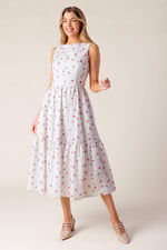 White and pink woven eyelet midi dress by Flying Tomato from the Thena Garden Party collection, shown on a model.