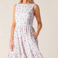 Flying Tomato Thena Garden Party woven eyelet midi dress in white and pink, featuring a flowy, feminine design perfect for summer events.