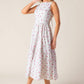 Flying Tomato Thena Garden Party woven eyelet midi dress in white and pink, featuring delicate eyelet details and a flowing silhouette.