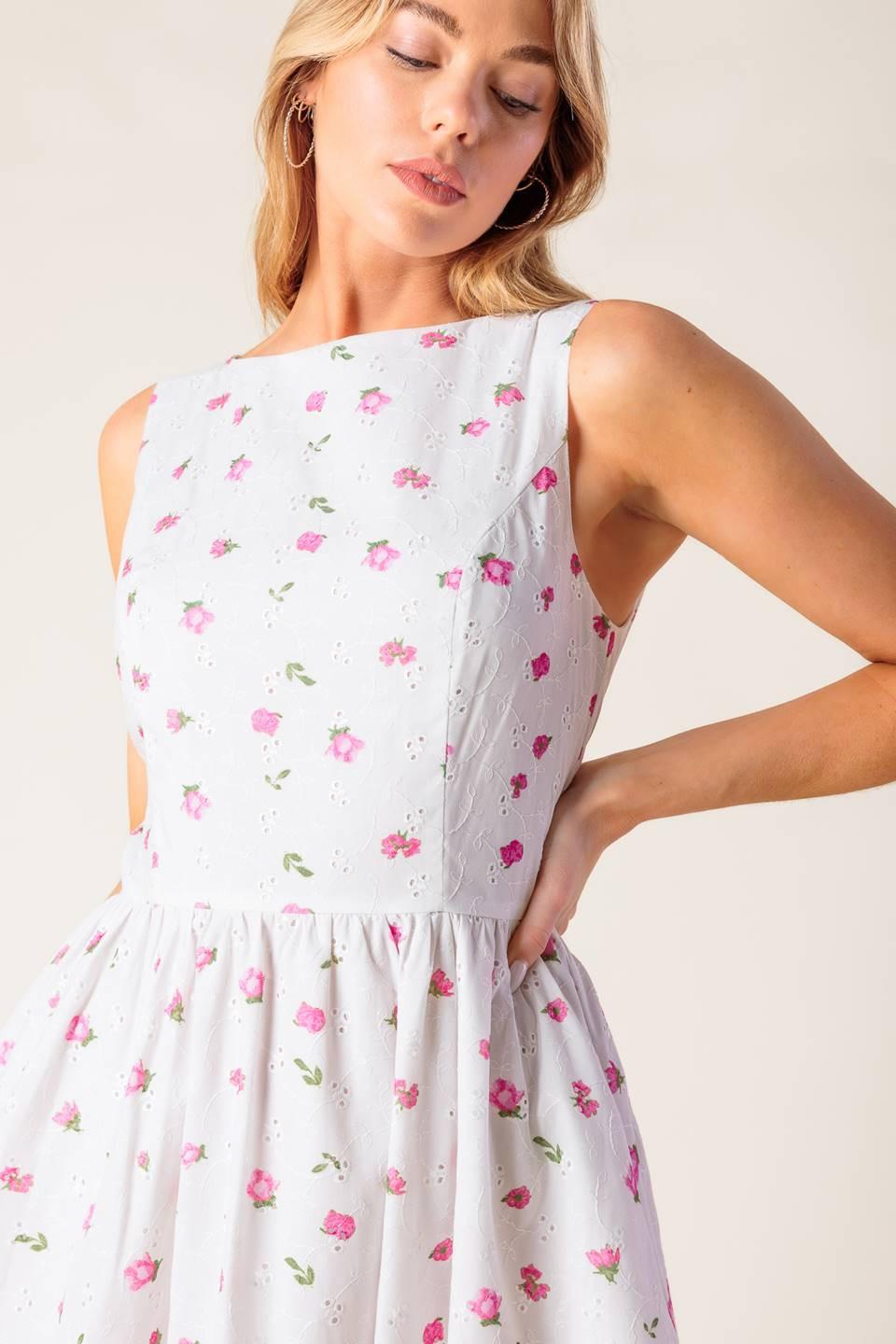 Flying Tomato Thena Garden Party woven eyelet midi dress in white and pink, featuring a feminine, floral design and elegant midi length.