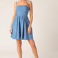 Light indigo Flying Tomato Back in Love Denim Mini Dress, casual sleeveless dress with a fitted silhouette and front button details.
