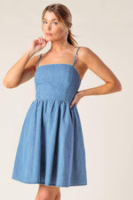 Light indigo Flying Tomato Back in Love Denim Mini Dress with adjustable straps and fitted silhouette, casual summer style.